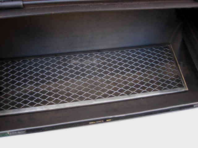 full view of lower lift out cooking grate in model 2040CC smoker pit